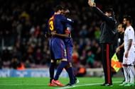 BARCELONA, SPAIN - APRIL 06:  Eric Abidal of FC Barcelona comes on for Gerard Pique